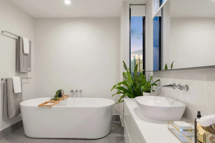 Contemporary bathroom with freestanding bath and countertop basin