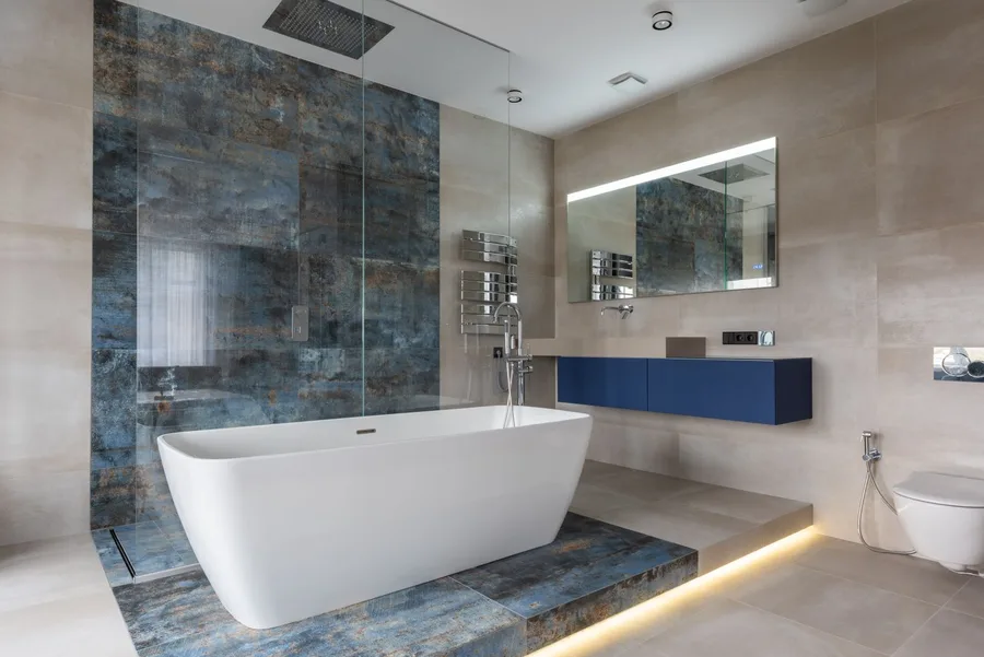 Bathroom interior with freestanding bath and coordinated fittings