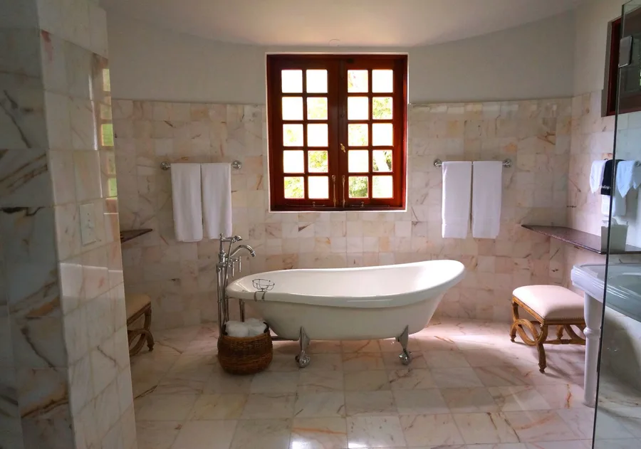 Light bathroom with a freestanding bath